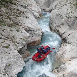a person riding on top of a rocky mountain