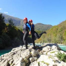 a man standing on a rocky hill