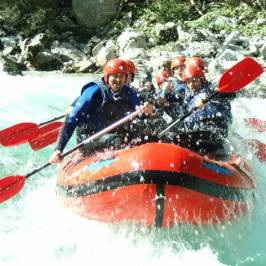 a man riding skis down a snow covered slope