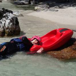 a raft next to a body of water