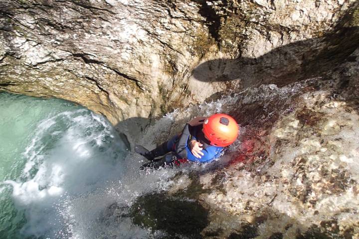 a person riding a wave on a surfboard in the water