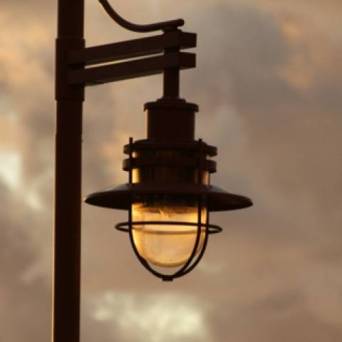 a lamp that is on a cloudy day