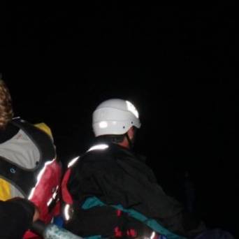 a couple of people that are standing in the snow