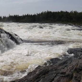 a waterfall in the snow