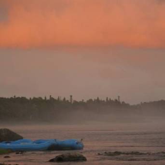 a sunset over a body of water