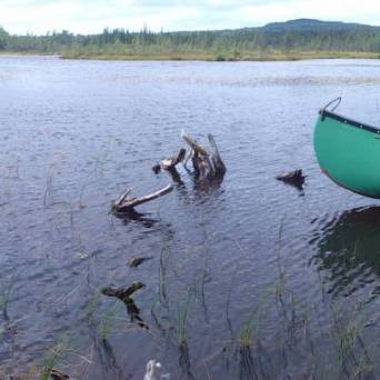 a small boat in a body of water
