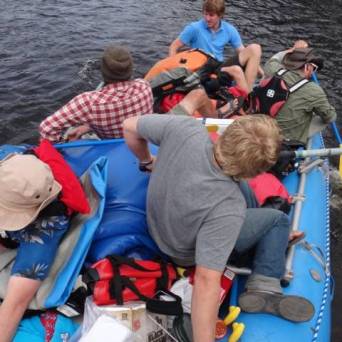 a group of people on a boat