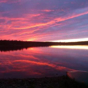 a sunset over a body of water