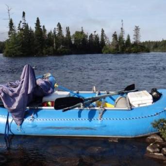 a small boat in a body of water