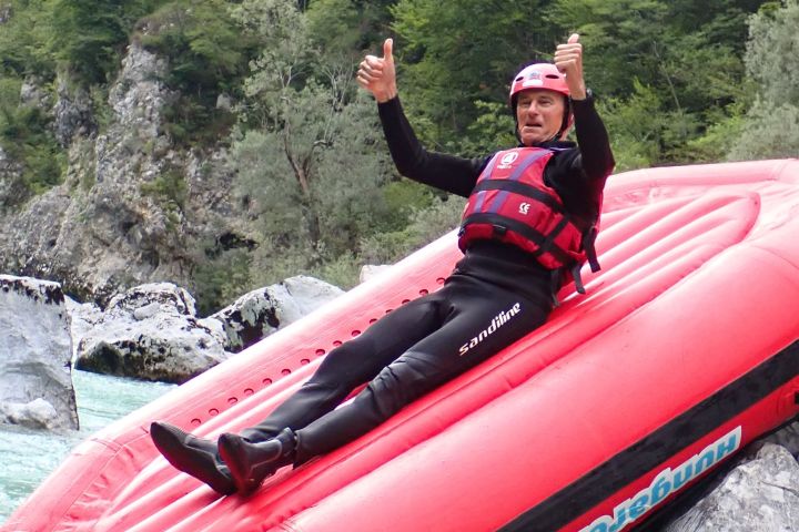 a raft next to a body of water